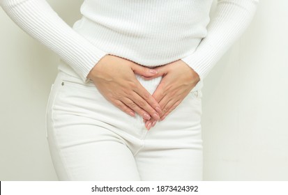 Abdominal pain of young woman, gynecological or medical problems concept