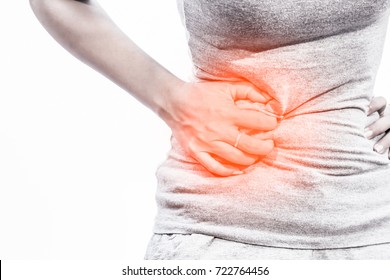 Abdominal Pain Of A Young Woman. Taken From The Front View On A White Background. Abdominal Pain Menstrual Pain Of Women