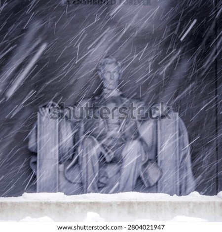 Abe sitting in the snow