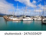 Abell Point Marina in Airlie Beach on the coast of Queensland facing the Whitsunday Islands in the Pacific Ocean, Australia