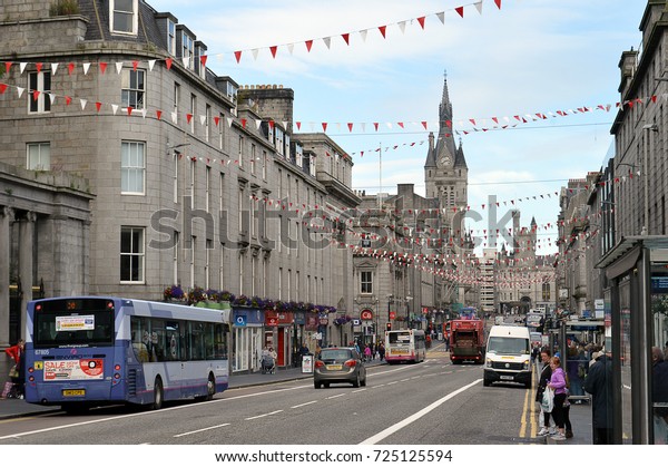 ABERDEEN, SCOTLAND - 22 SEPTEMBER 2017: Union\
Street, the city of Aberdeen\'s main thoroughfare, looking towards\
the Salvation Army citadel in Castlegate and the tower and spire of\
Aberdeen Townhouse.