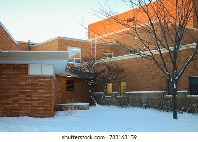 Aberdeen, South Dakota / USA - September 5 2013: A Landscape Of A Building Surrounded By Snow At Northern State University