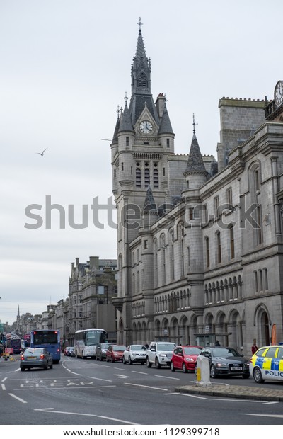 Aberdeen, United Kingdom - 8 November 2017:\
Building and cars along Union street, a major street and shopping\
thoroughfare in Aberdeen,\
Scotland.