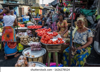 Abidjan, Ivory Coast – January 19, 2013 – Local vendors with their products in the commune of Adjamé, Abidjan. 