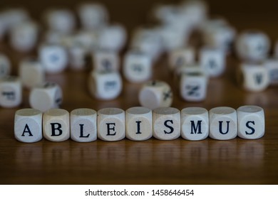 Ableism Written With Wooden Cube