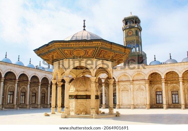 The ablution fountain and the clock tower in Muhammad Ali mosque at ...