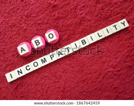 ABO Incompatibility, word cube with background.