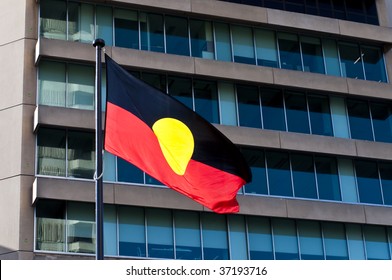 Aboriginal Flag In Front Of A Modern Australian Building