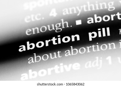 Abortion Pill Word In A Dictionary. Abortion Pill Concept.