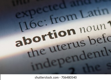 abortion word in a dictionary. abortion concept