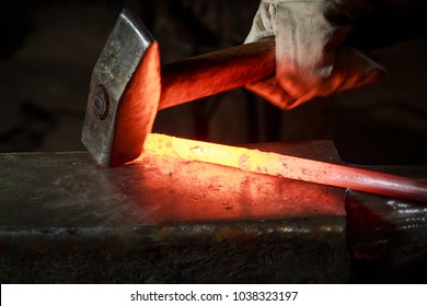 About artistic Forging of Metal. Blacksmithing. Pattern and forms for the artist blacksmith. Treatment of molten metal close-up. Handmade blacksmith. - Powered by Shutterstock