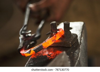 About artistic Forging of Metal. Blacksmithing.
Pattern and forms for the artist blacksmith.
Treatment of molten metal close-up. Handmade blacksmith.