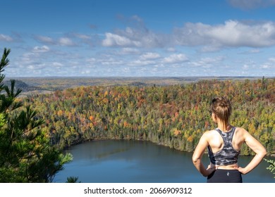 Above Bean and Bear Lakes in Minnesota, during the fall - woman posing