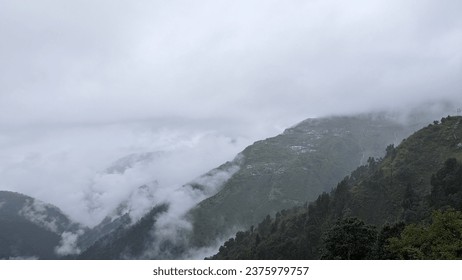 Up and above the clouds in Sikkim - Shutterstock ID 2375979757