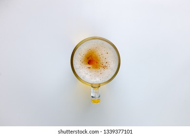 Above The Glass Of Beer On A White Top