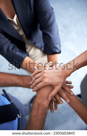 Above, hands and team of business people for support, solidarity and synergy of success, agreement and trust. Hand, stack and group cooperation of collaboration, mission and winning partnership goals