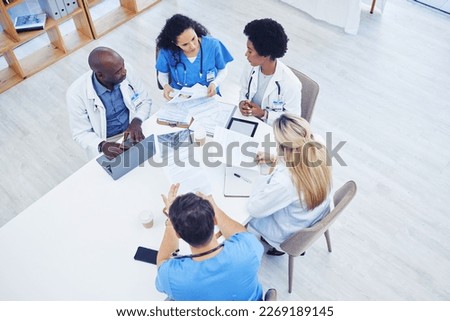 Above, healthcare and meeting by doctors on laptop for research, planning and innovation at hospital. Doctor, team and health experts brainstorm, problem solving or discussing online project together
