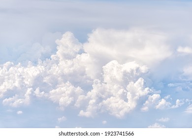 Above High Angle View Of Sky Cloudscape With Fluffy Clouds And Bright Soft Sunny Sunlight Aerial View Of Europe From Airplane