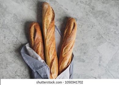 From above photo of french baguette bread. - Shutterstock ID 1050341702