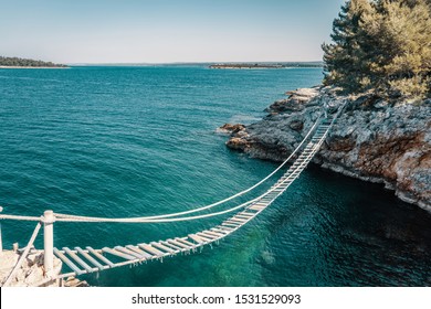 Above The Rope Bridge Over A Cliff In Punta Christo, Pula, Croatia - Europe. Travel Photography, Perfect For Magazines And Travel Destination Articles.