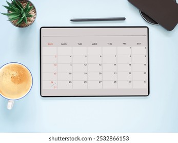 Above, tablet computer with an open app of the calendar for month and a cup of coffee on a blue background for setting weekly, and monthly goals to achieve the goals set. Concept schedule planning