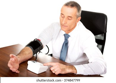 Above View Businessman Measuring Blood Pressure