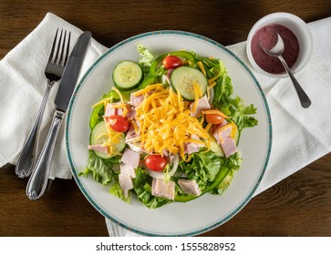 From Above View Of House Or Chef Salad Takeout Food Plated At Home With Napkin