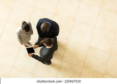 Above View Of Professional Business People Having Meeting