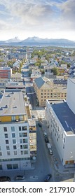 Above View Of Urban City Streets In Popular Overseas Travel Destination In Bodo, Norway. Busy Downtown Centre And Urban Infrastructure Of Building Architecture With Scenic Mountains In The Background