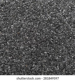 Abrasive Texture Roofing Material Close-up. Abstract Dark Granular Background.