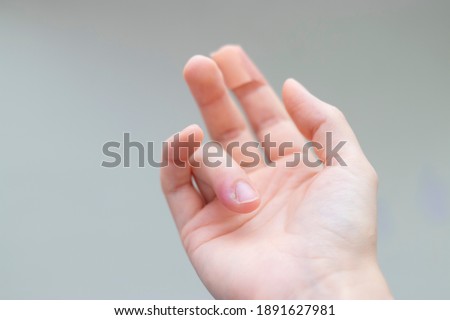 abscess on the finger. person with finger infection disease. fingernail pain. copy space