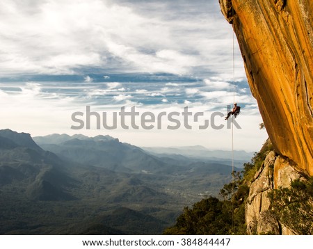 Similar – Rock climbing team bivouaced in a storm.