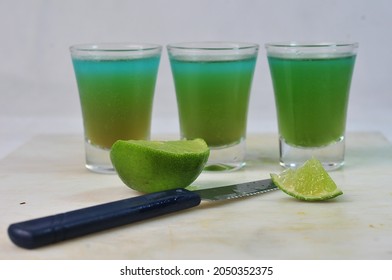 absinthe drink, drips with lemon sugar and ice, refreshing juice, burning water, vodka