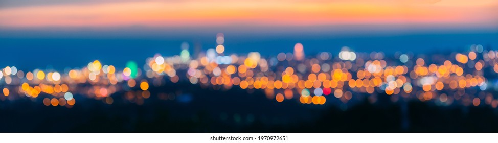 Absract Blurred Bokeh Architectural Urban Backdrop. Real Blurred Colorful Bokeh Background With Defocused Lights