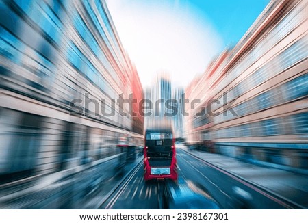 Absrtact motion speed effect with London double bus in background