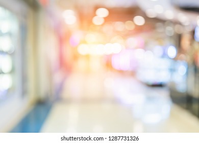 abstact blur image background of shopping mall with crowd people - Shutterstock ID 1287731326