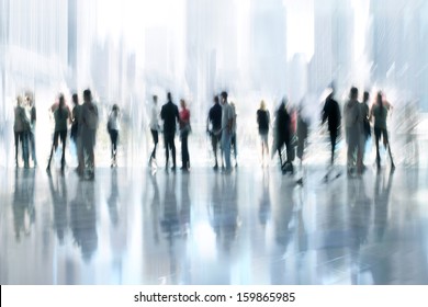 abstakt image of people in the lobby of a modern business center with a blurred background