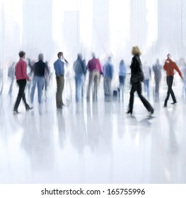 Abstakt Image Of People In The Lobby Of A Modern Business Center With A Blurred Background