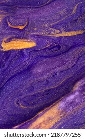 Abstrac texture background with bright puple gold waves.