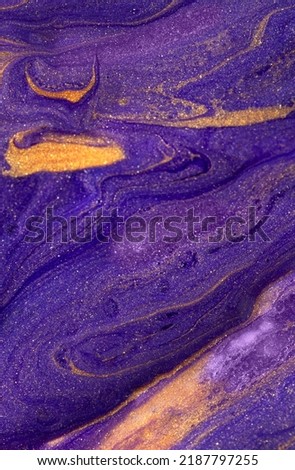 Abstrac texture background with bright puple gold waves.