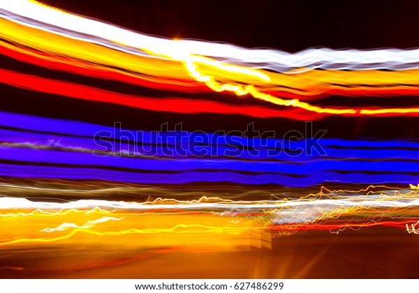Abstract acceleration speed motion light at night\
on the street.