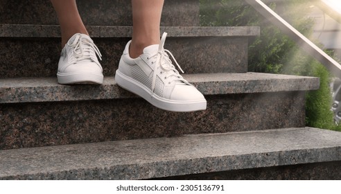 Abstract adult male guy worker body modern sporty sole hurry town work house upstair life energy move forward idea concept. Closeup view boy jogger job rise grow office career level upward training - Powered by Shutterstock