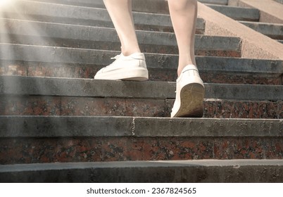 Abstract adult male guy worker body modern sporty sole hurry town work house upstair life energy move forward idea concept. Closeup view boy jogger job rise grow office career level upward training - Powered by Shutterstock