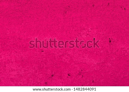 abstract aged pink limestone texture for use as background.