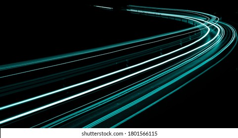 abstract aquamarine lights of cars at night - Shutterstock ID 1801566115