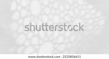 Abstract Arabesque shadow background with traditional ornaments and cement wall texture. Islamic Ramadan design.
