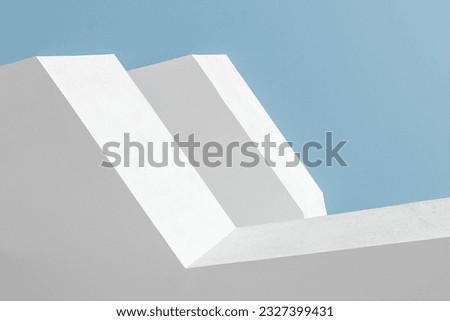 Abstract architecture background texture. Close up of geometric structure made of balconies fragments, white buildind walls against clear blue sky. Concrete, perspective, composition, minimal, angular