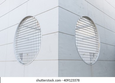 Abstract architecture. Close up of facade with circular windows