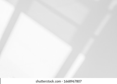 Abstract architecture shadow and lights in office room  on white wall  from window, dark shadows indoor in house  background, monochrome, black and white