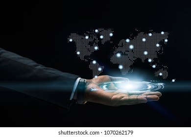 Abstract art of Hand of Business man Holding the virtual hologram future system.  Innovation Business Financial and Technology concept.